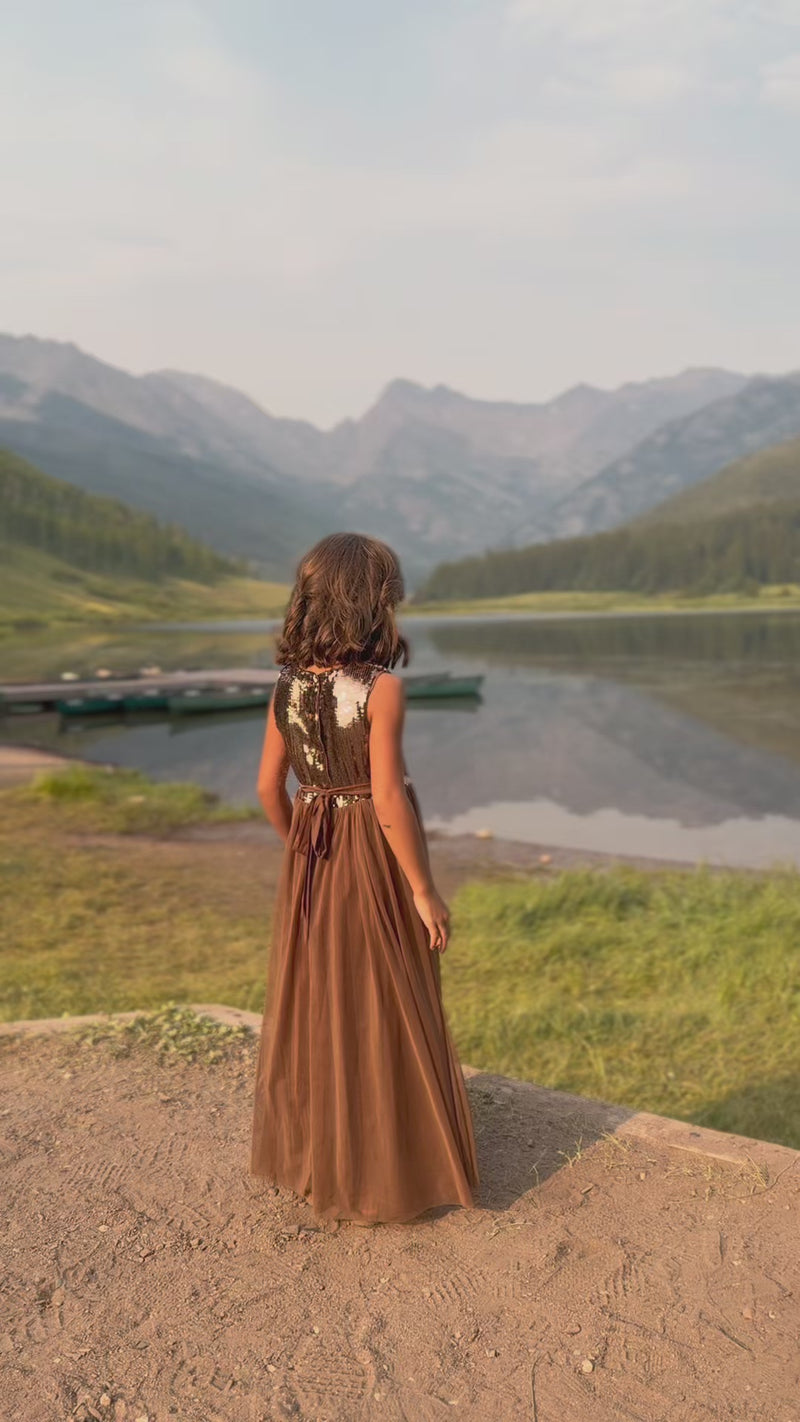 SS Girl's Dress Noelle Dress (sequin cocoa tulle) Girl modeling the Indie Blue Noelle Sequin Tulle Dress in Cocoa, twirling by a mountain lake during a fall-inspired outdoor photoshoot.