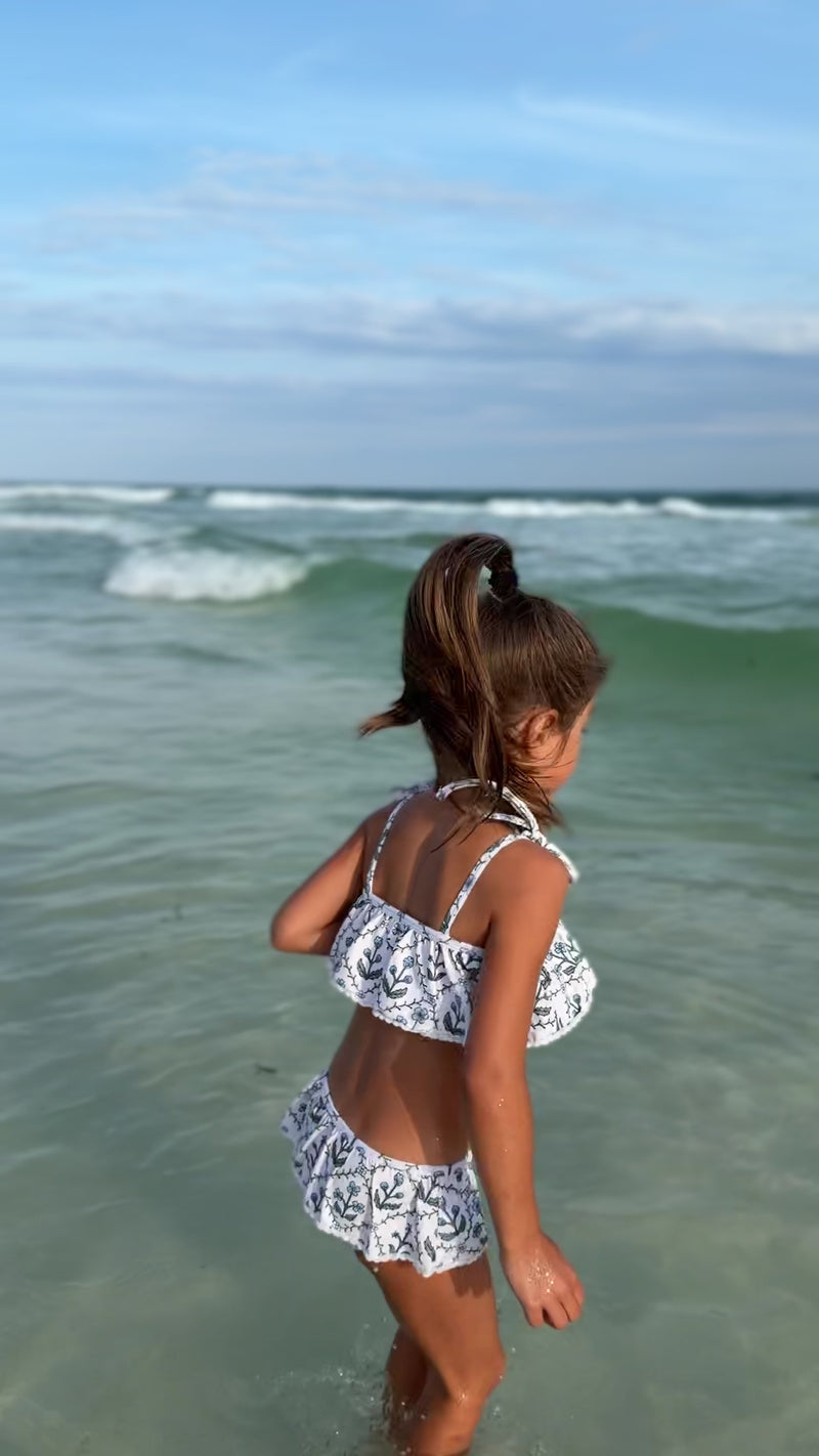 Video of girl wearing Indie Blue Skirted Ruffle Set in Bluebell on the beach