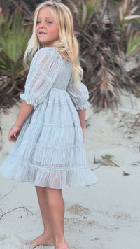 Video of girl in Indie Blue Karina Dress Blue Chiffon Twirling on the Beach